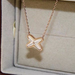 chaumet style rose gold x shape necklace